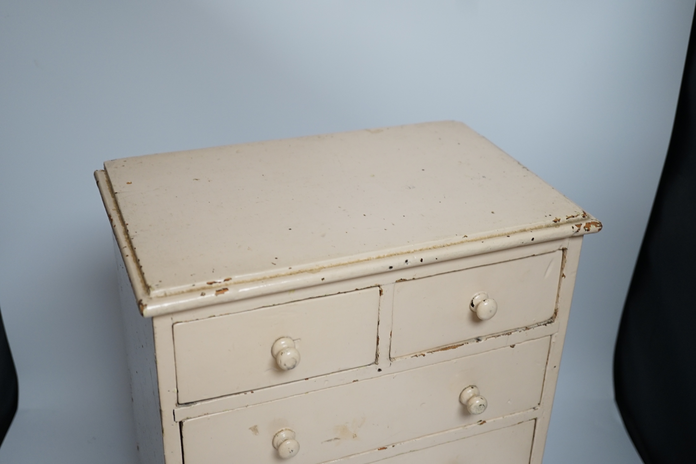 A Victorian miniature chest, later painted, width 32cm, height 44cm